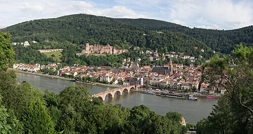 Königstuhl, the old town of Heidelberg and the castle, seen from the Philosophenweg. On the banks of the Neckar the submarine U-17 on the way to the Sinsheim Technology Museum